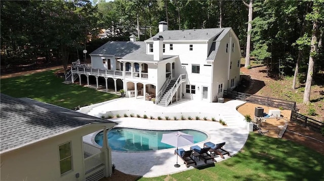 12410 Charlotte Dr, Alpharetta, GA 30004 - rear view of property with stairs, a chimney, a deck, a fenced backyard, and a patio area