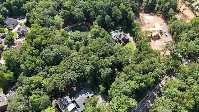 12410 Charlotte Dr, Alpharetta, GA 30004 - rear view of house featuring a chimney, a shingled roof, and a yard