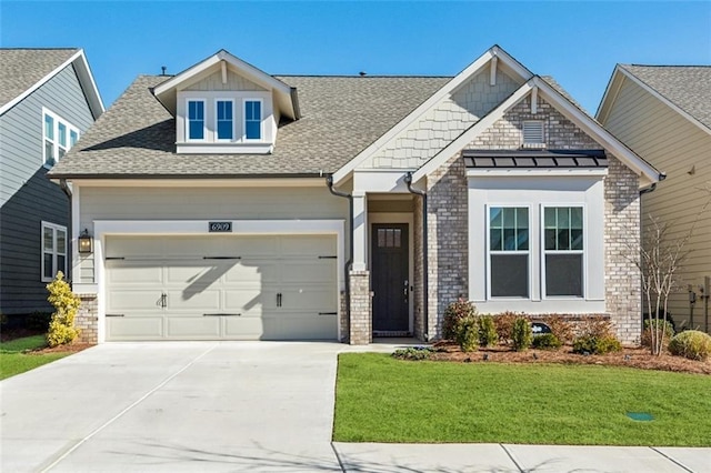 craftsman-style home with a garage and a front lawn