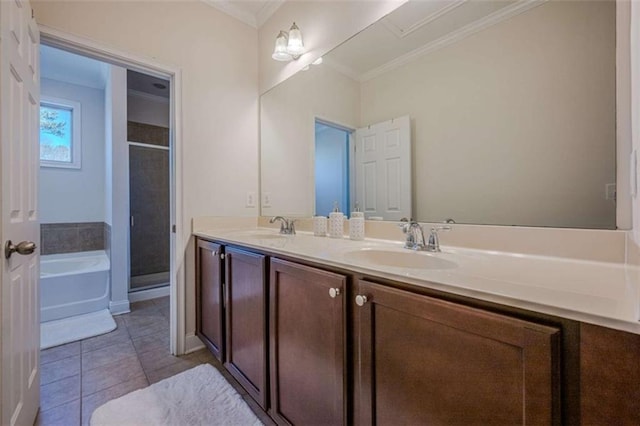 bathroom featuring vanity, separate shower and tub, ornamental molding, and tile patterned floors