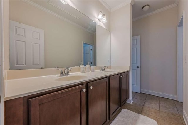 bathroom with tile patterned flooring, vanity, and ornamental molding