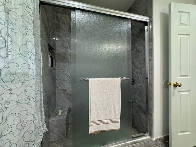 2194 Klondike Rd SW, Conyers, GA 30094 - full bathroom featuring a shower stall
