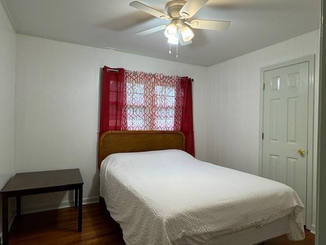 2194 Klondike Rd SW, Conyers, GA 30094 - bedroom with wood finished floors and ceiling fan