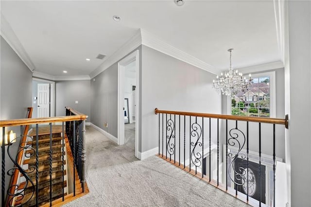 hallway featuring crown molding, light carpet, and a notable chandelier