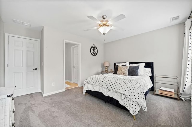 carpeted bedroom featuring ceiling fan