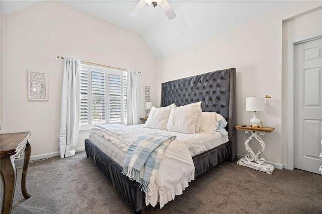 bedroom with vaulted ceiling, ceiling fan, and dark carpet