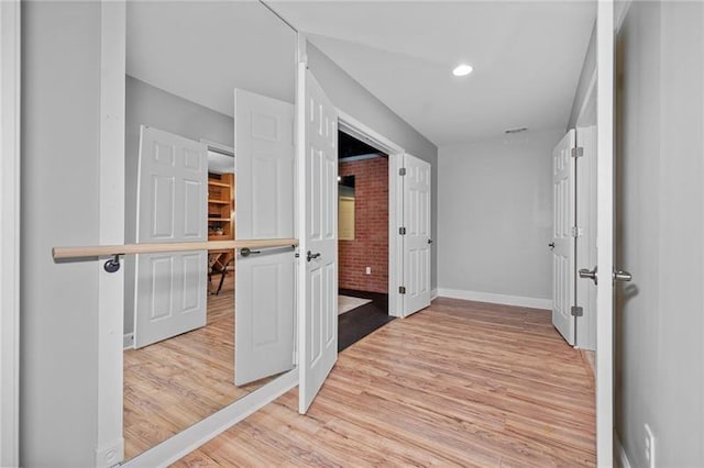 hallway featuring light hardwood / wood-style flooring