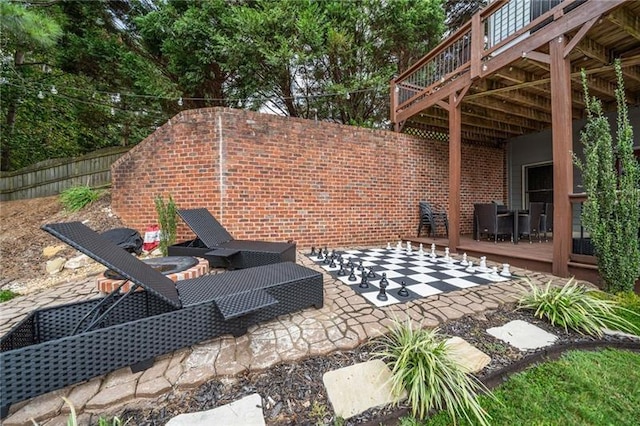 view of patio featuring a wooden deck