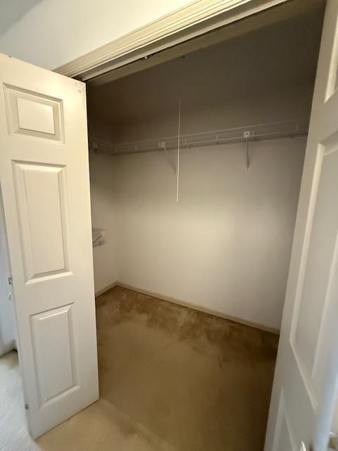 full bath with vanity, toilet, brick patterned floor, wallpapered walls, and shower / bath combination