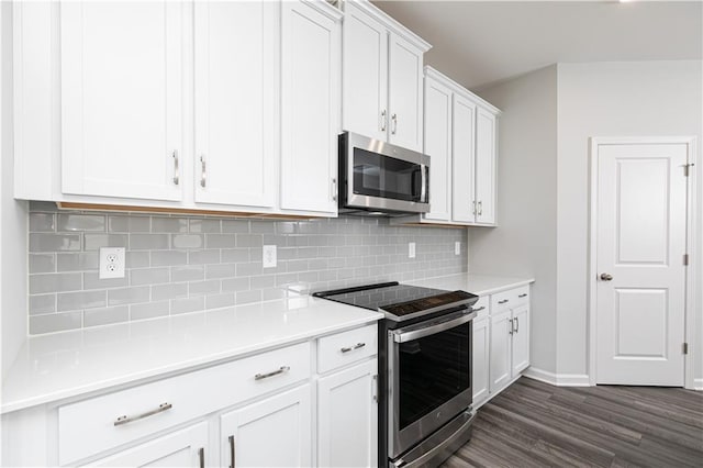 805 York Aly, Acworth, GA 30102 - kitchen with stainless steel appliances, backsplash, white cabinets, and dark wood finished floors