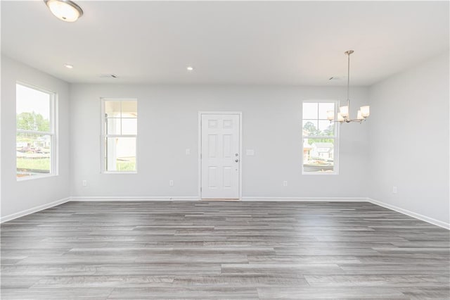 805 York Aly, Acworth, GA 30102 - empty room featuring a chandelier, wood finished floors, and recessed lighting