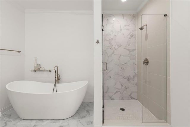 full bath featuring a shower stall, baseboards, ornamental molding, a soaking tub, and marble finish floor