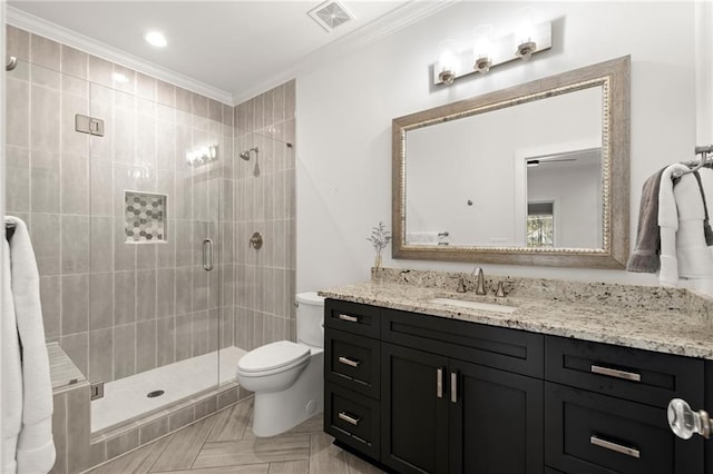 full bathroom with visible vents, a stall shower, toilet, and crown molding