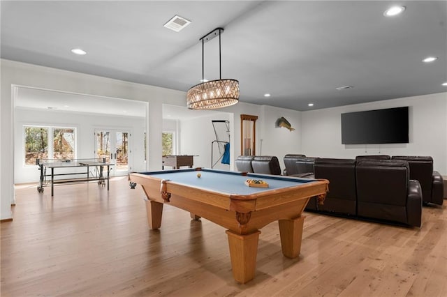 4100 Thunderbird Dr, Marietta, GA 30067 - recreation room featuring crown molding, plenty of natural light, light wood finished floors, french doors, and recessed lighting