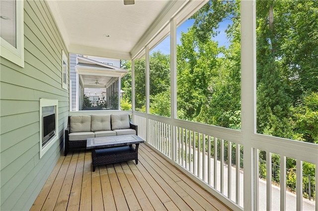 2059 Wheaton Way, Atlanta, GA 30328 - sunroom with outdoor lounge area and view of scattered trees