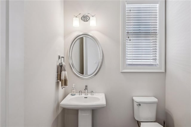2059 Wheaton Way, Atlanta, GA 30328 - half bathroom featuring toilet and a sink
