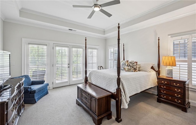 2059 Wheaton Way, Atlanta, GA 30328 - bedroom with light colored carpet, access to outside, multiple windows, a tray ceiling, and ornamental molding