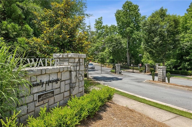 2059 Wheaton Way, Atlanta, GA 30328 - community / neighborhood sign featuring a gate