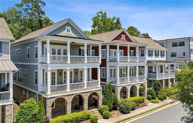 2059 Wheaton Way, Atlanta, GA 30328 - view of front facade featuring a balcony and covered porch