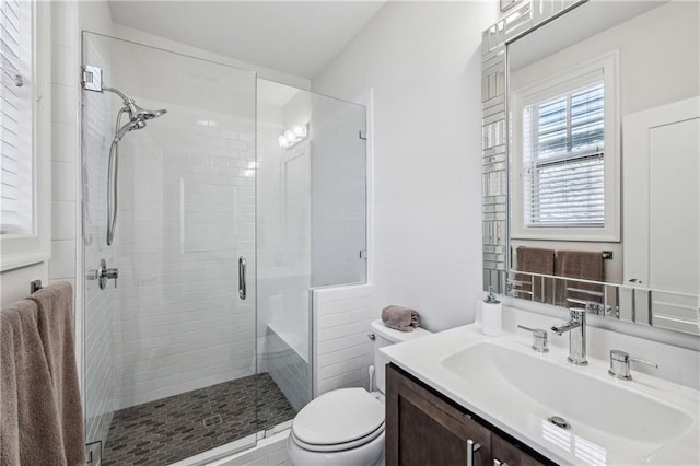 2059 Wheaton Way, Atlanta, GA 30328 - bathroom featuring a stall shower, toilet, and vanity