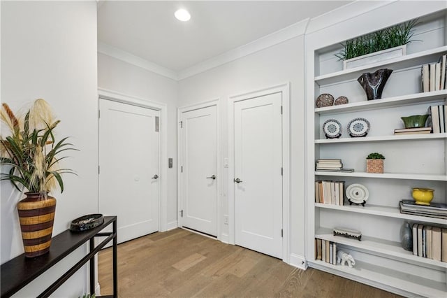 2059 Wheaton Way, Atlanta, GA 30328 - corridor with wood finished floors and crown molding