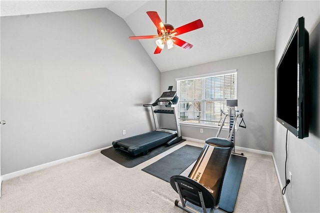 exercise area with a ceiling fan, vaulted ceiling, carpet, and baseboards