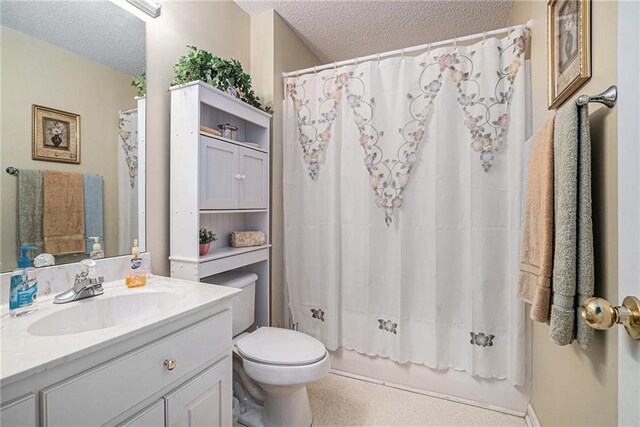 138 Victoria Ln, Lavonia, GA 30553 - full bathroom with vanity, a textured ceiling, shower / bath combo with shower curtain, and toilet