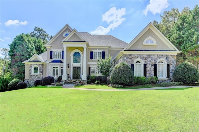 view of front of property with a front lawn