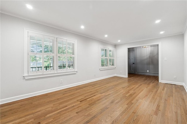 unfurnished bedroom with light hardwood / wood-style floors and crown molding