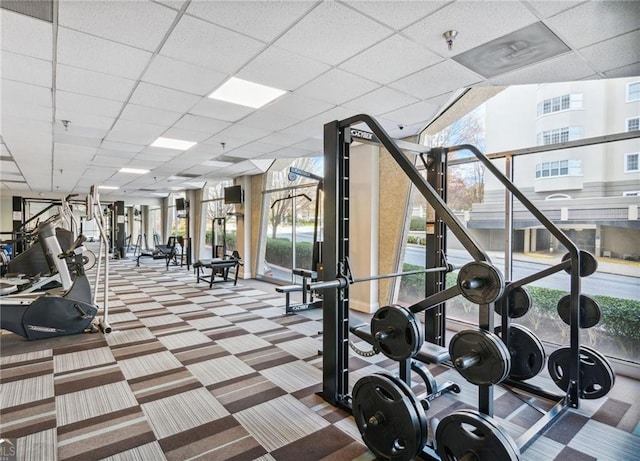 2479 Peachtree Rd Unit 503, Atlanta, GA 30305 - exercise room with a paneled ceiling and carpet flooring