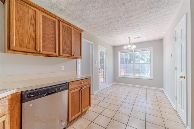 647 New England Way, Lawrenceville, GA 30046 - kitchen featuring dishwasher, light countertops, brown cabinetry, a chandelier, and a textured ceiling
