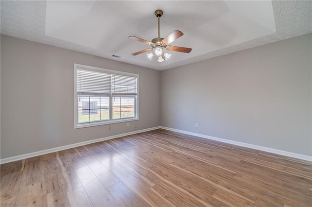 647 New England Way, Lawrenceville, GA 30046 - spare room with baseboards, light wood finished floors, and ceiling fan