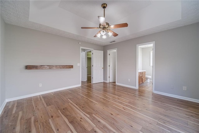 647 New England Way, Lawrenceville, GA 30046 - empty room featuring a ceiling fan, baseboards, and light wood-style flooring