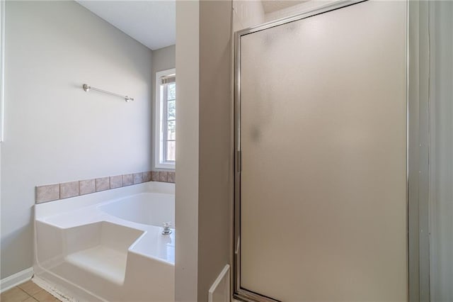 647 New England Way, Lawrenceville, GA 30046 - full bathroom with a shower stall, a bath, and tile patterned flooring