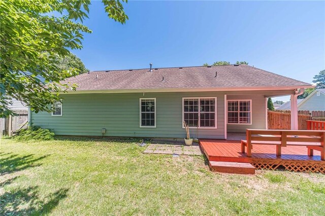 647 New England Way, Lawrenceville, GA 30046 - rear view of house with a wooden deck and a shingled roof