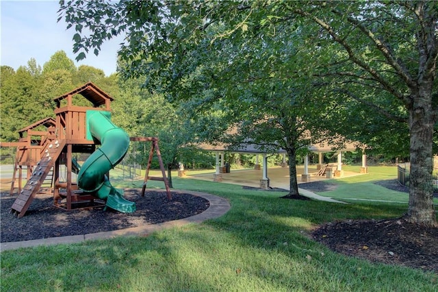 view of playground featuring a lawn