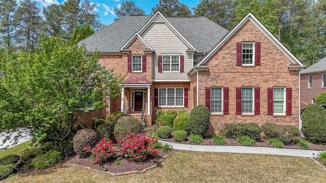 2439 Huntington Park Dr NW, Acworth, GA 30101 - view of front of house featuring brick siding and a shingled roof