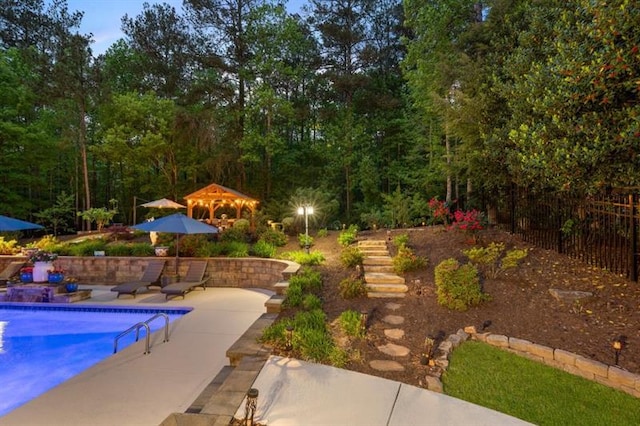 2439 Huntington Park Dr NW, Acworth, GA 30101 - view of swimming pool featuring a fenced in pool, a patio area, and fence