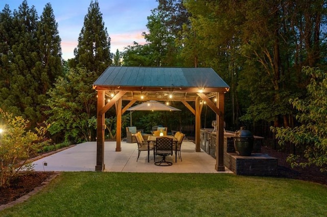 2439 Huntington Park Dr NW, Acworth, GA 30101 - view of patio featuring a gazebo, exterior kitchen, and grilling area