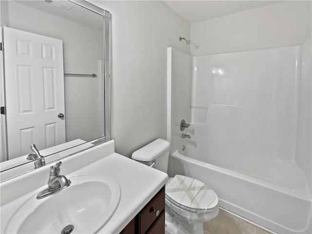 full bathroom featuring visible vents, tub / shower combination, vanity, and toilet