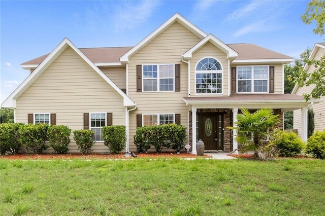 view of front of home featuring a front yard