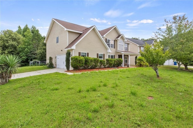 view of front of house with a garage and a front lawn