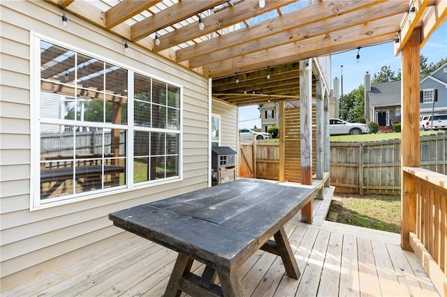 wooden deck with fence and a pergola