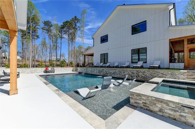 132 Swift Creek Way, Jefferson, GA 30549 - view of pool featuring an in ground hot tub and a patio