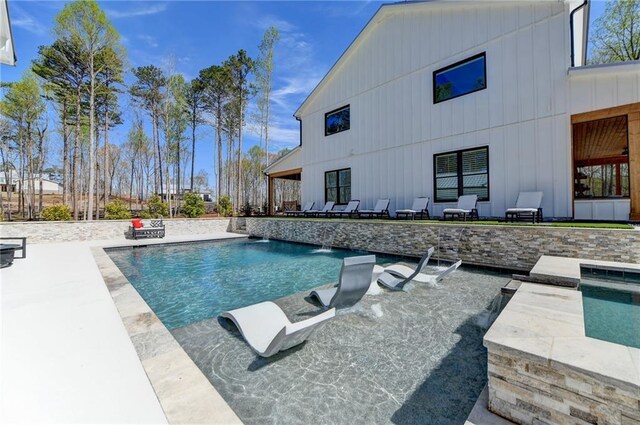 132 Swift Creek Way, Jefferson, GA 30549 - view of pool with pool water feature and a patio