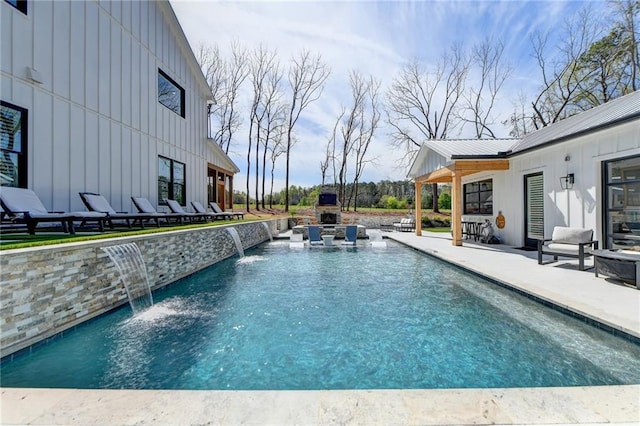 132 Swift Creek Way, Jefferson, GA 30549 - view of swimming pool featuring pool water feature, a patio, and an outdoor fireplace