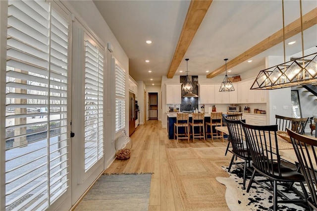132 Swift Creek Way, Jefferson, GA 30549 - dining room with beamed ceiling and light hardwood / wood-style floors