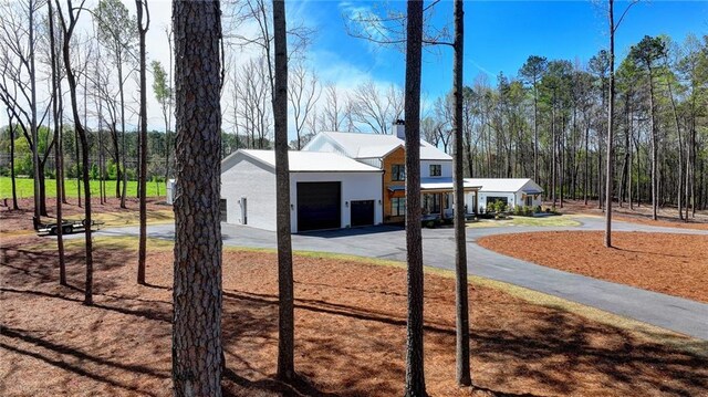 132 Swift Creek Way, Jefferson, GA 30549 - exterior space featuring a garage