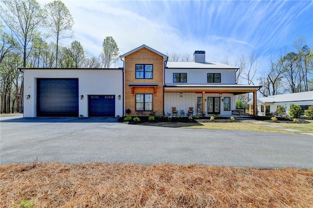 132 Swift Creek Way, Jefferson, GA 30549 - view of front of home with a garage and covered porch