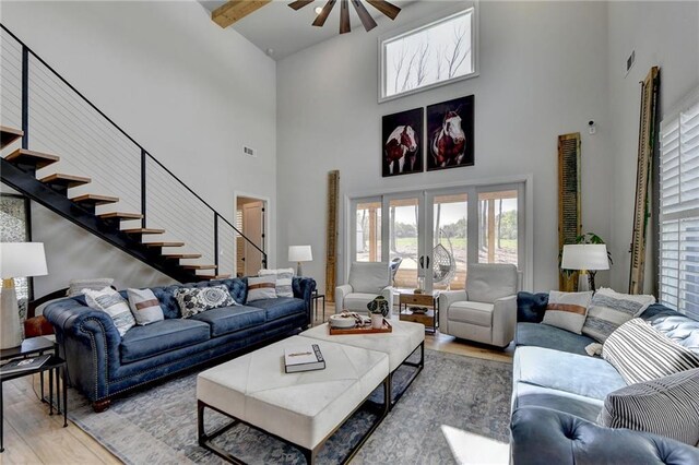 132 Swift Creek Way, Jefferson, GA 30549 - living room featuring beam ceiling, wood-type flooring, high vaulted ceiling, and french doors